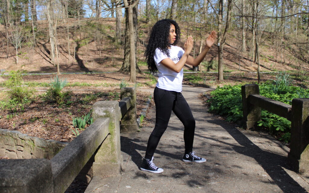 Woman standing in WingChun guard position